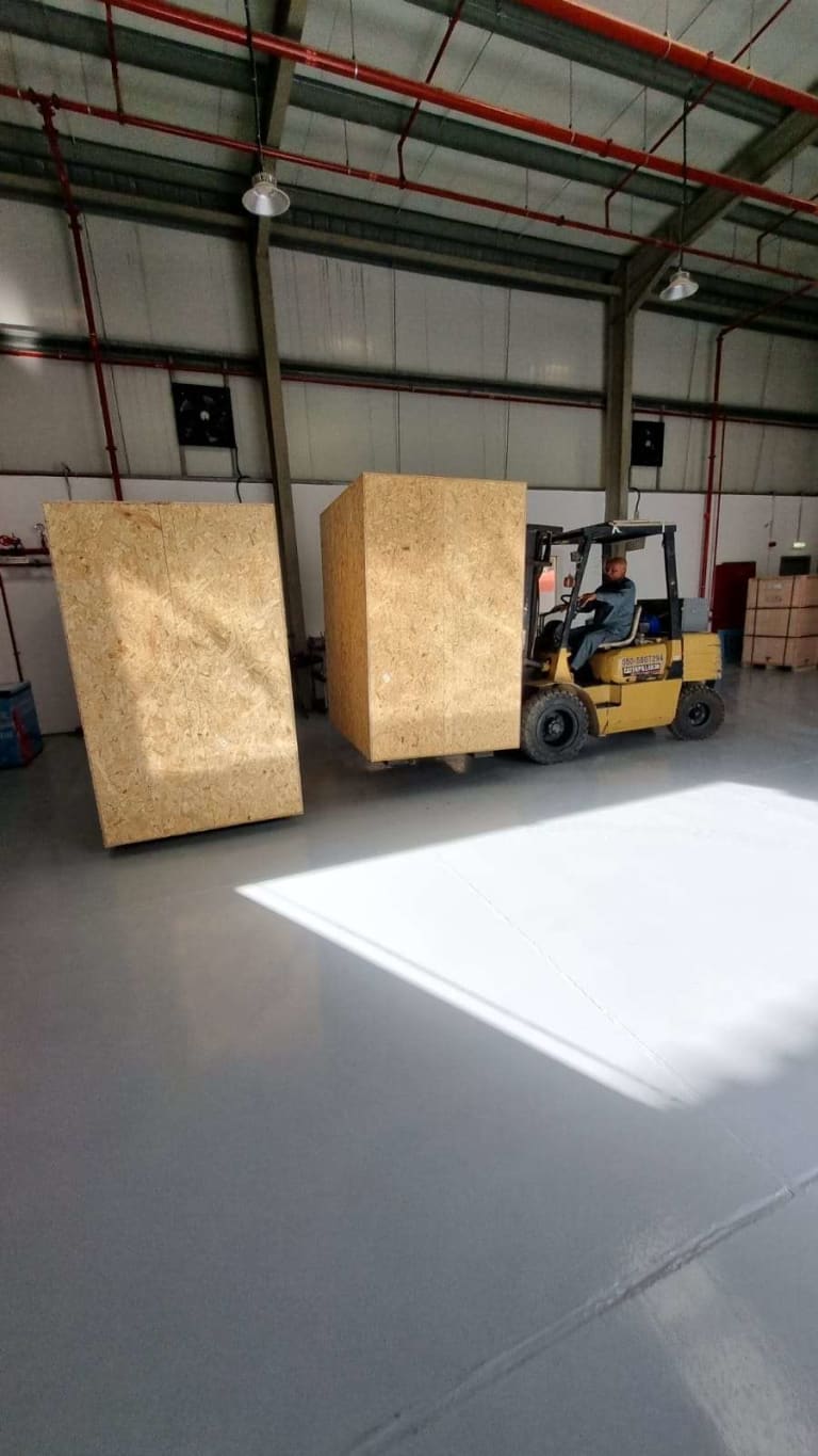 Loading Team Loading New Kiosks For Clients - robotic cafe manufacturer