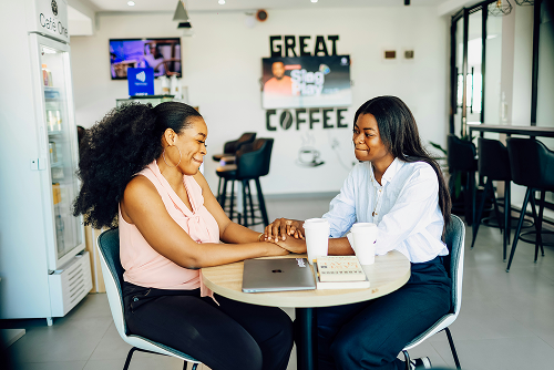 Two women in conversation during a mentorship session