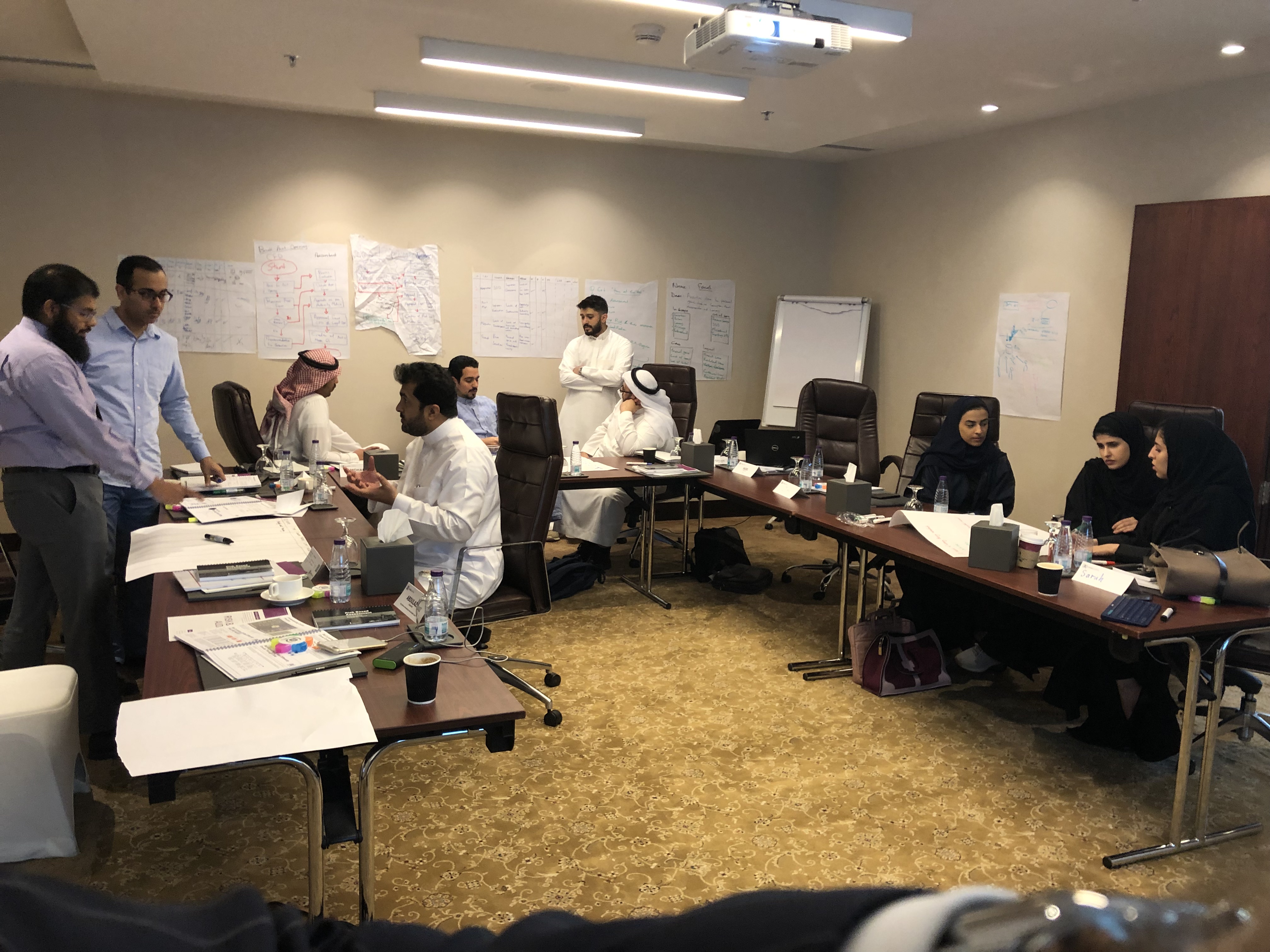 Delegates working through a course exercise