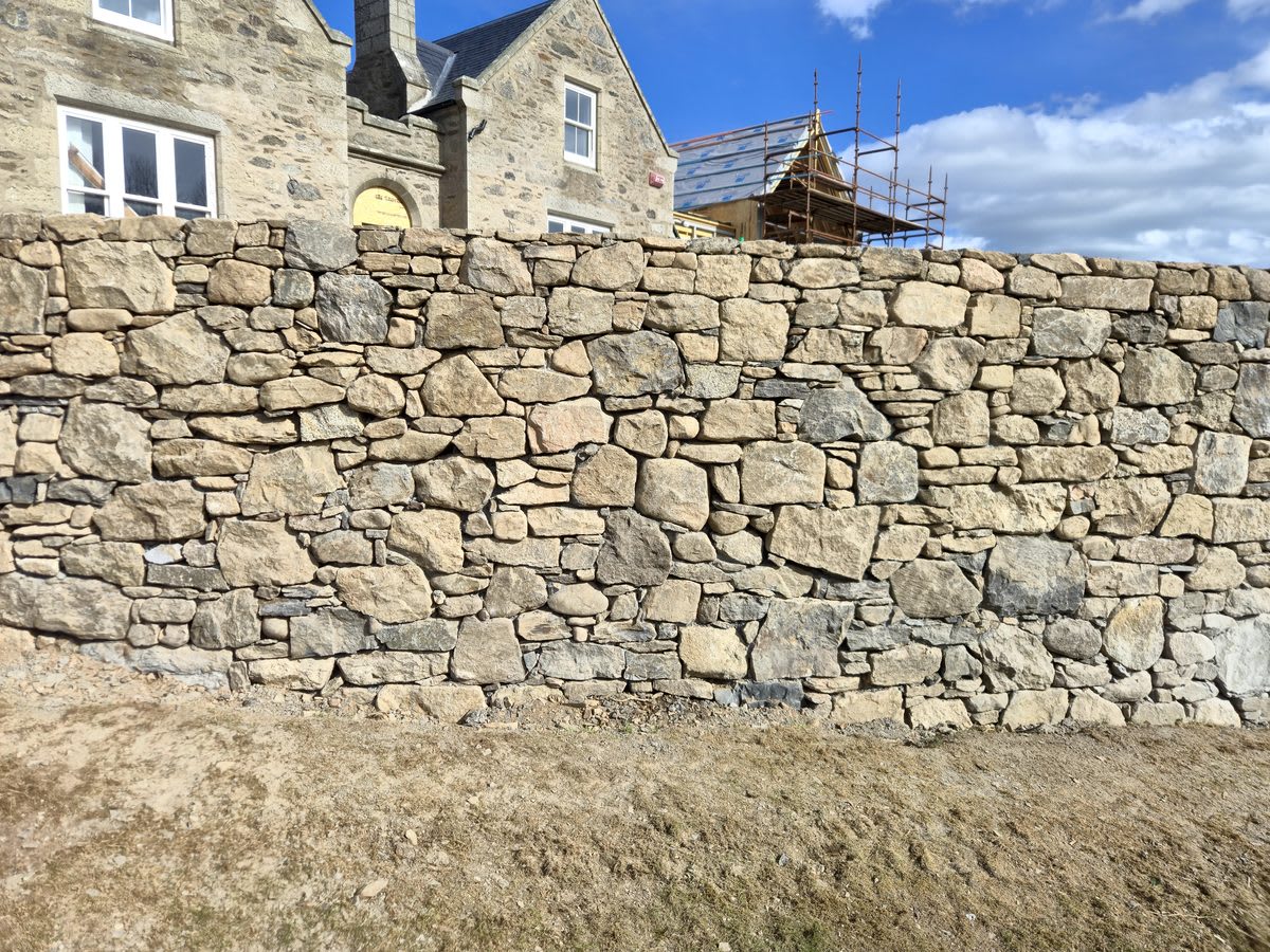 30-metre dry stone retaining wall in Aberdeenshire - hero shot - Masowa & Son