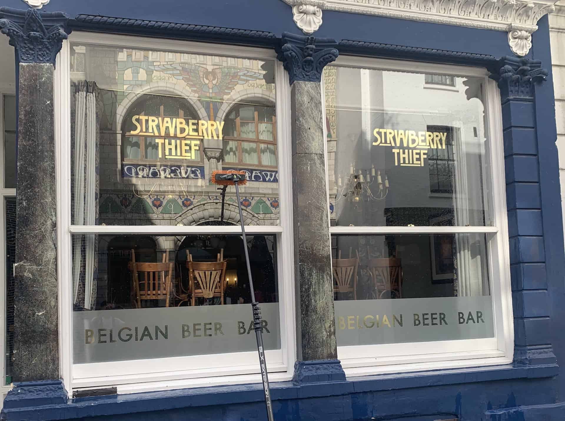 Commercial window cleaning at a Bristol shopfront — TOUGH