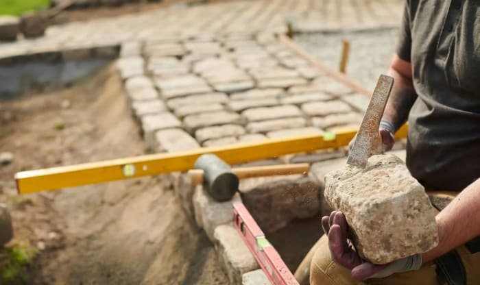 Montrose Landscapes delivering expert garden landscaping and hardscaping in Surrey, creating bespoke outdoor spaces with precision craftsmanship.