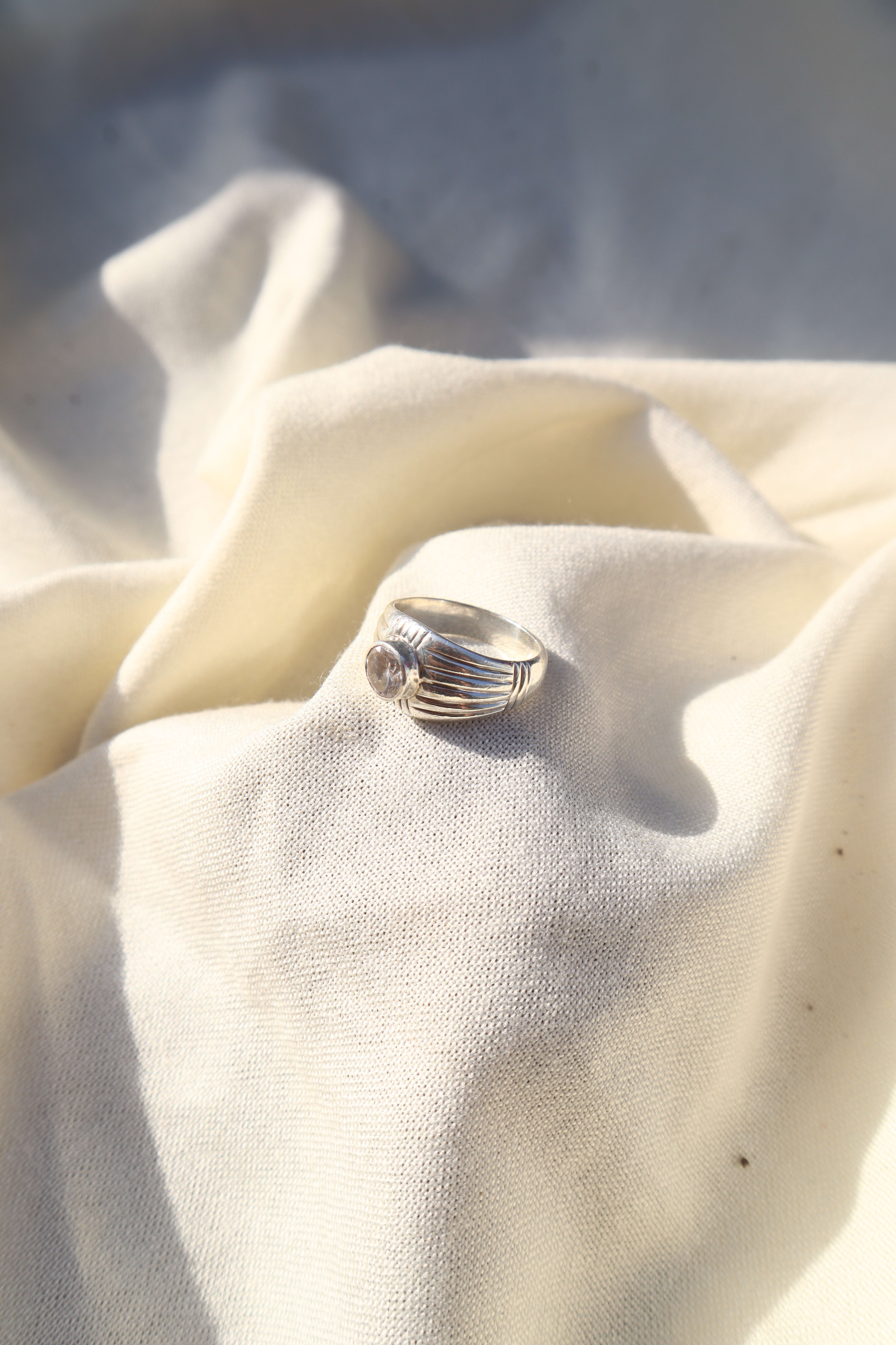Silver Crossed Zircon ring