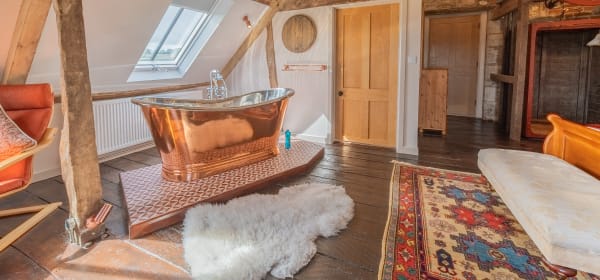 Copper bathtub, attic room