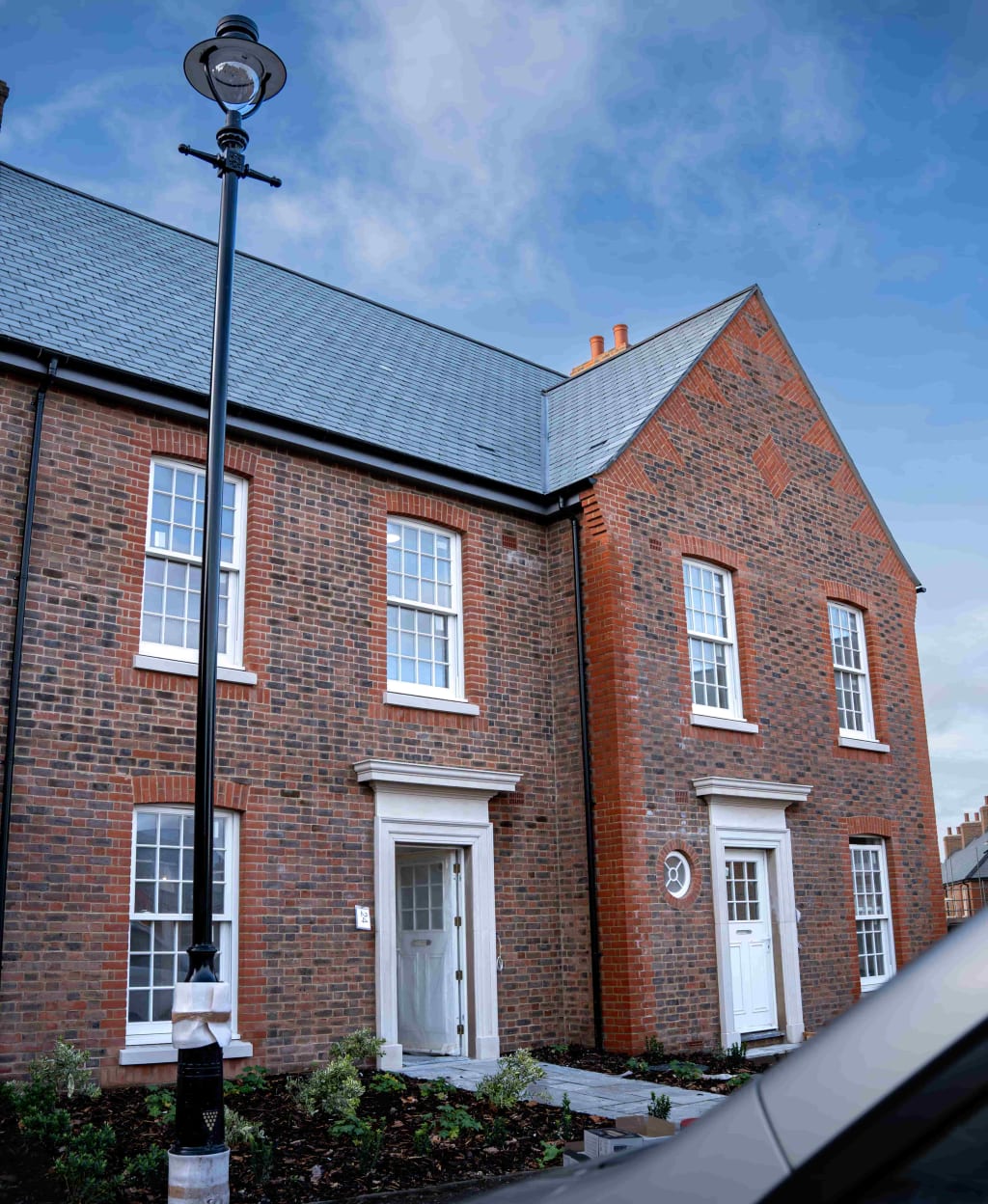 Wide exterior property shot captured for construction brand storytelling. in Dorset