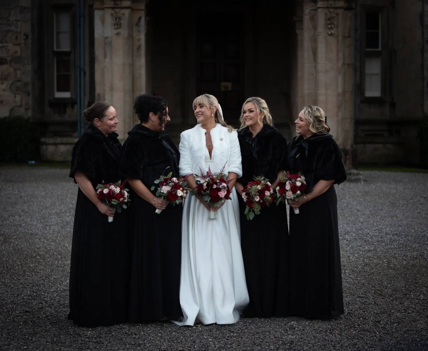 Bride and Bridemaids outside the chuurch