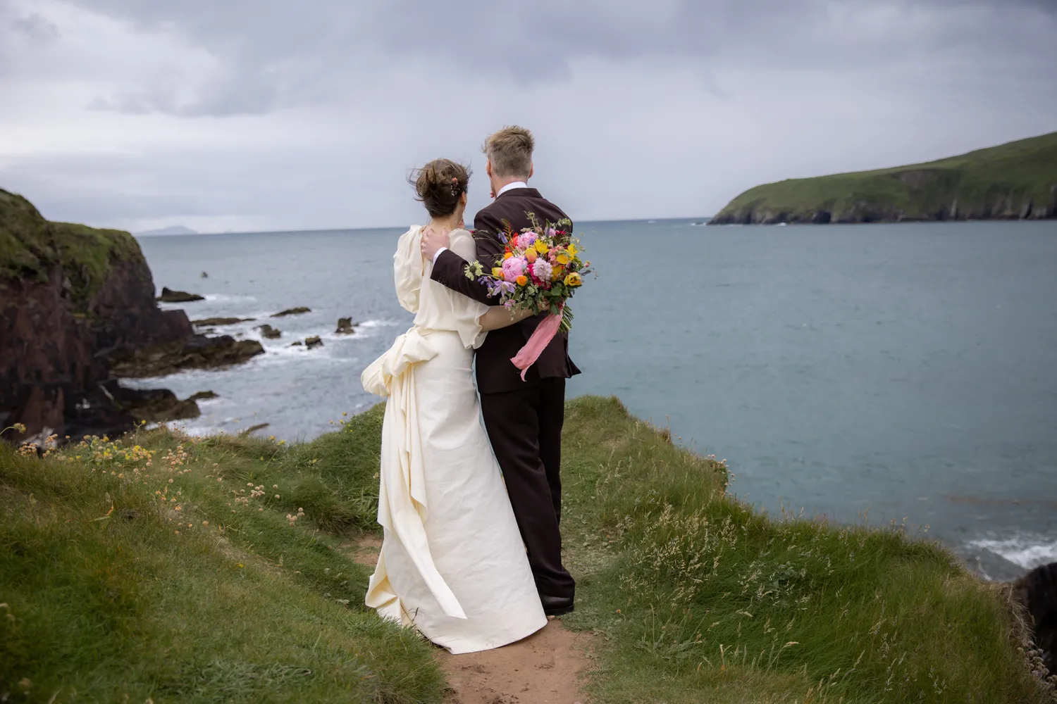 Bride and Groom embracing in a scenic location