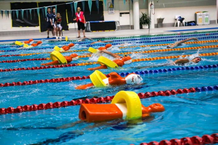 The Junior Lifeguard Club (JLC) offers a unique aquatic alternative to traditional test-sheet-based aquatic programs and is independent of traditional award progressions. JLC is for quick learners and those between levels or programs who thrive in an energetic learning environment. Members can be any age between 8 and 15 years.