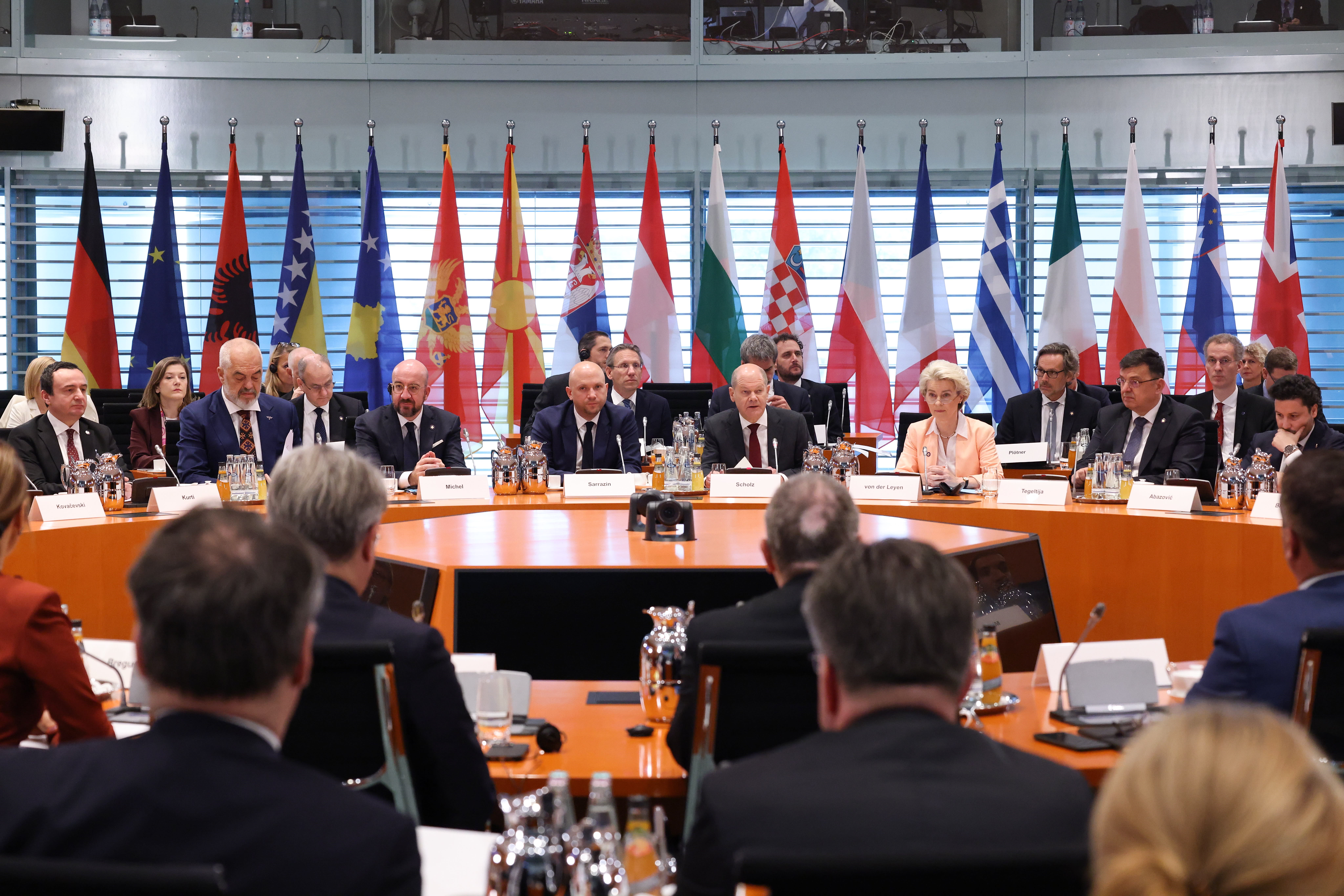European leaders sitting at a security briefing