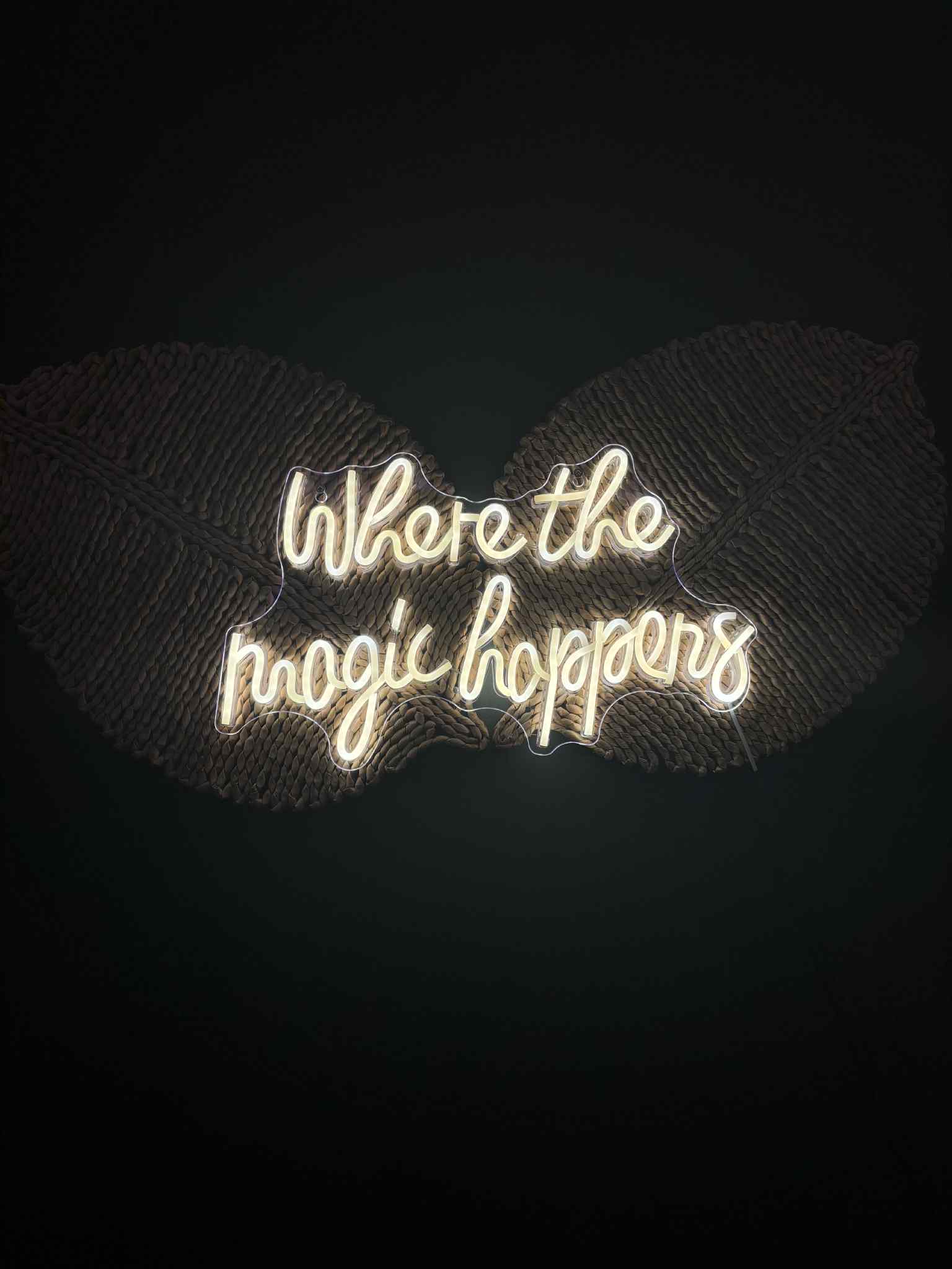 Image of 'Where The Magic Happens' signage