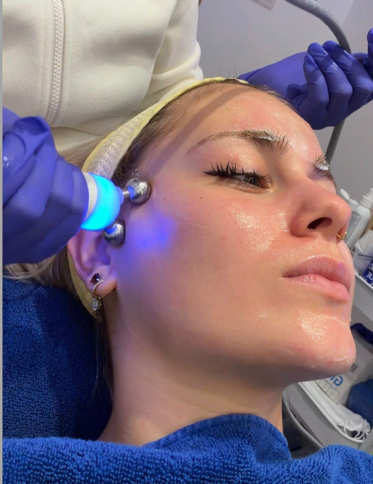 Julia holding product in lifestyle setting with natural light