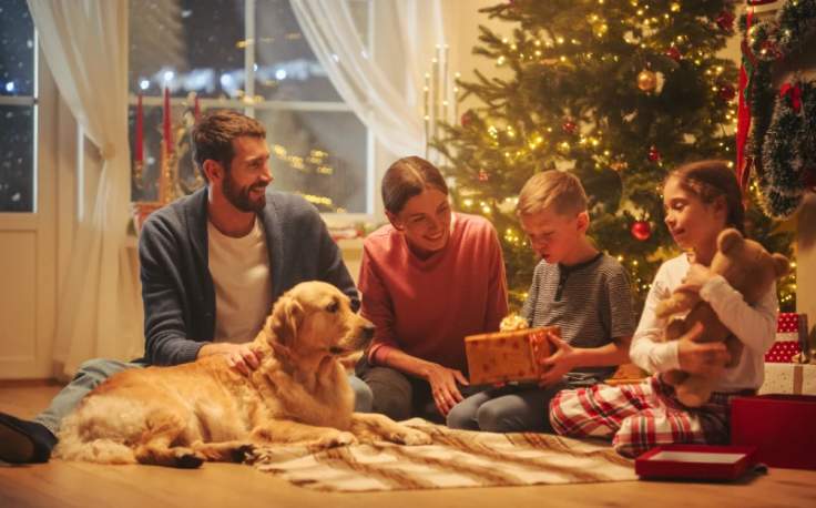 Dove andare a Natale, Una famiglia e il suo cane a Casa festegiano a Natale