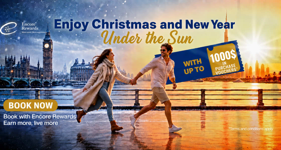 Couple running from wintry London to sunny Dubai — Encore Rewards Christmas and New Year offer, up to $1000 in vouchers.