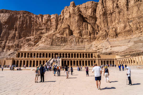 a group of tourists in front of Hatshepsut temple,Cairo and Nile Cruise Package: 9 Days from the Pyramids to the Valley of the Kings
