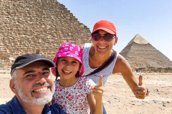 family enjoying visiting pyramids of giza, 8-Day Egypt Itinerary — Cairo, White Desert National Park & Luxor