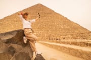 woman taking selfie in front the great pyramid, Cairo Tour