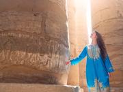 a female tourist wearing traditional egyptian dress in the temples of upper egypt, 8-Day Egypt Itinerary — Cairo, White Desert National Park & Luxor