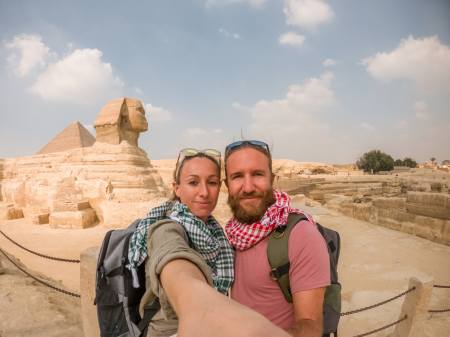 couple take selfie in front of the sphinx, 