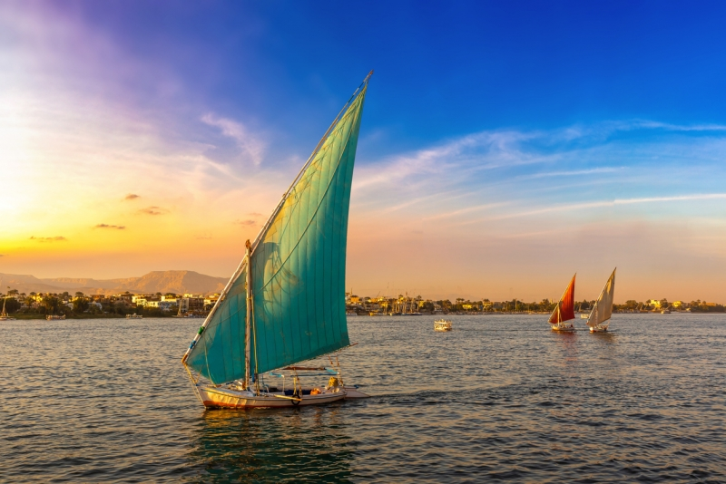 Sail boat on the Nile at sunset, Nile Valley