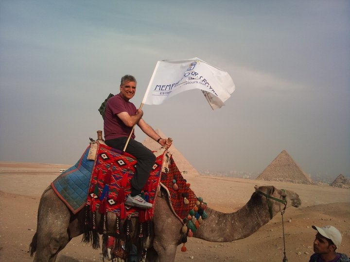 Enjoying A Camel Ride in Giza Pyramids