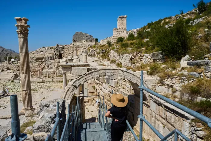 A tourist looking Sagalassos on metal stairs