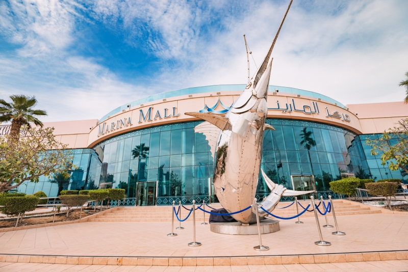 Marina mall entrance with steel swordfish sculpture