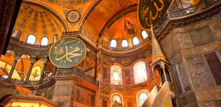 HACI BEKTAS, TURKEY - AUGUST 25: Old woman visiting at famous mosque of Haci  Bektas Veli and behind writes the rules of humanity on August 25, 2013 in  Nevsehir, Turkey Stock Photo - Alamy