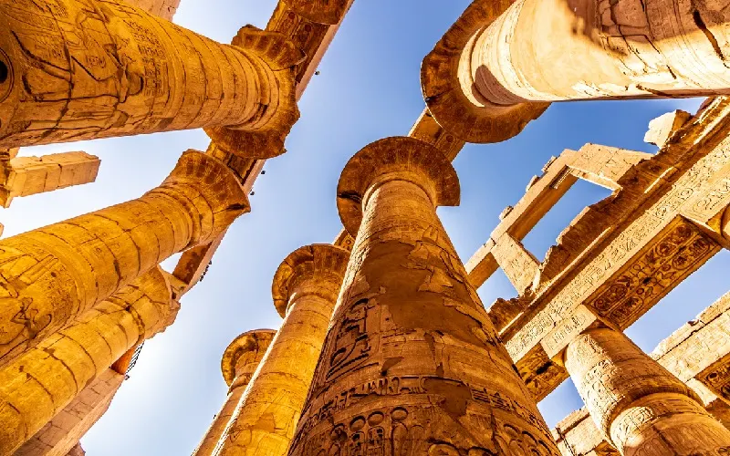 Columns with hieroglyphs inside the temple of Karnak, the great sanctuary of Amun