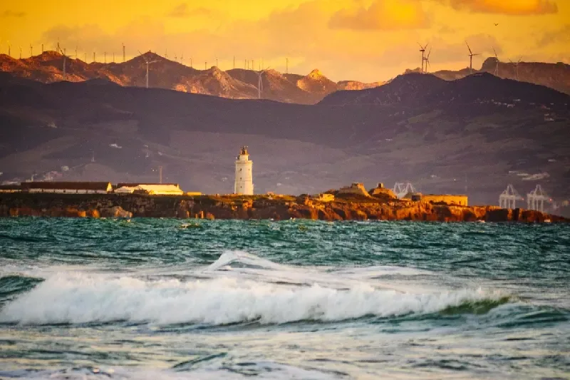 Sea coast and Tarifa town on skyline in Spain
