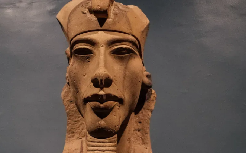 Sandstone statue of King Akhenaten in the Luxor Museum