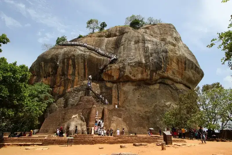 A group of visitors climbing Lion Rock (Sigiriya)