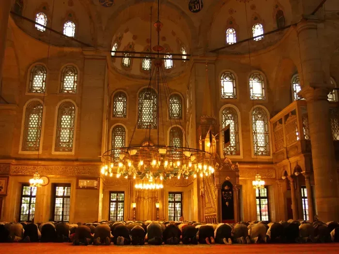 People are praying in Eyup Sultan Mosque