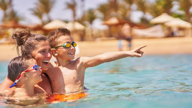 A Mom and Her Sons Enjoying Egyptian Beach