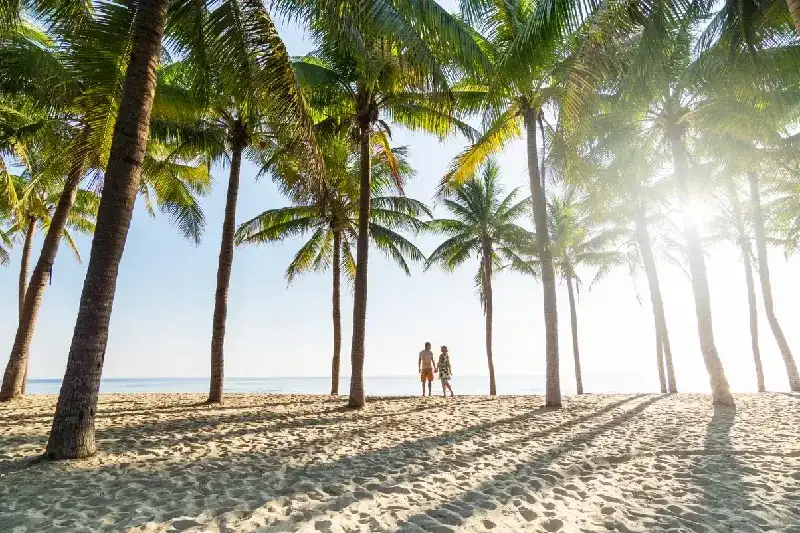 A couple enjoying the serenity of a quiet beach setting in Vietnam