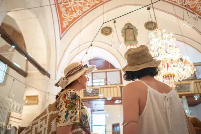 Two female tourists in side of Rumi Mosque