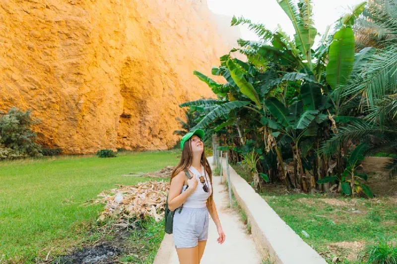 Woman Hiking in Wadi Ash Shab