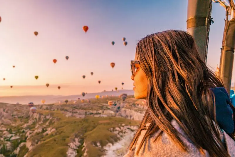 A tourist in a hot air balloon in Cappadocia 