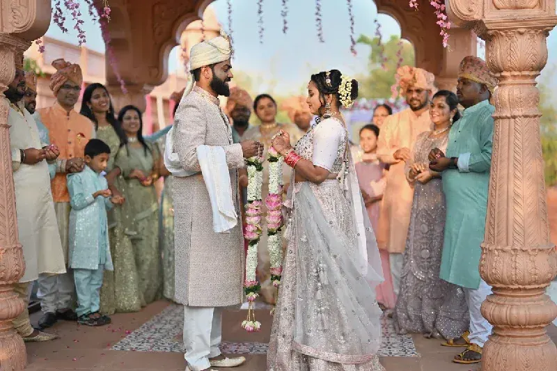 Smiling bride and groom in their wedding in India