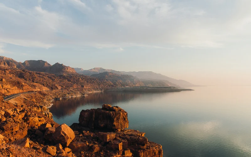 High angle view off the magical sunset above the beautiful mountain and sea landscape in Jordan
