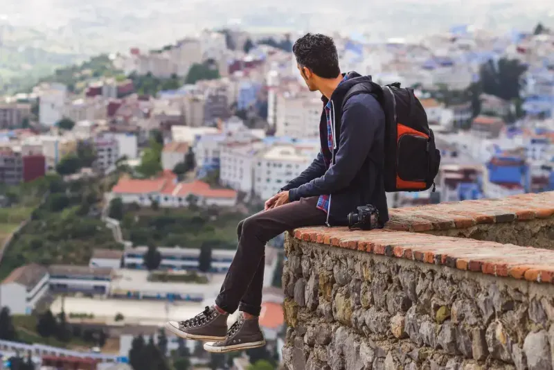 Tourist Looking At City View