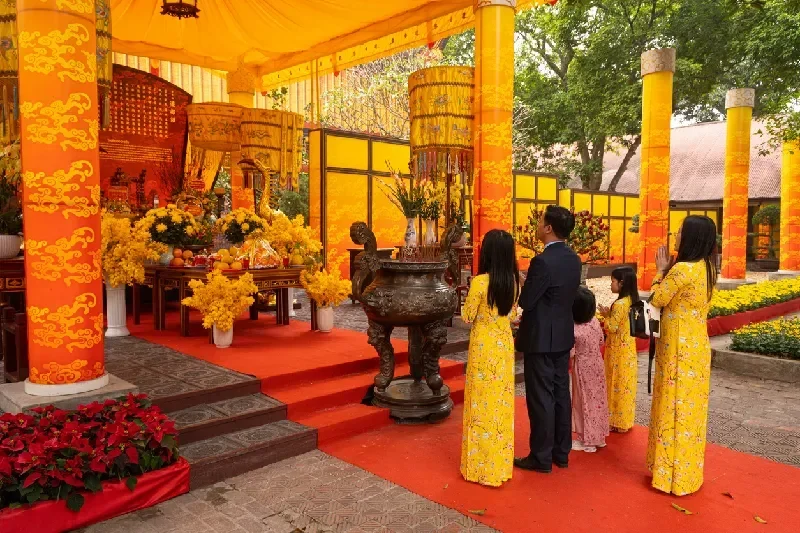 Praying in the temple inside the Thang Long Imperial Citadel