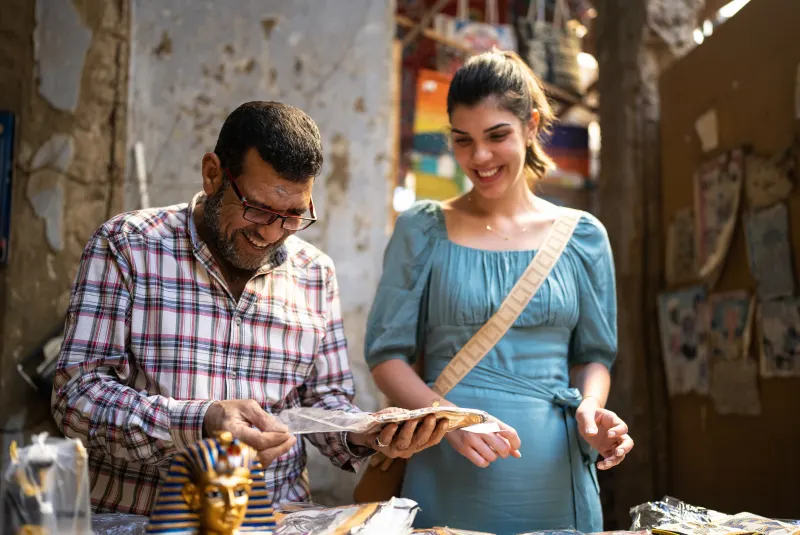 A woman Traveller in A local Egyptian antiques shop