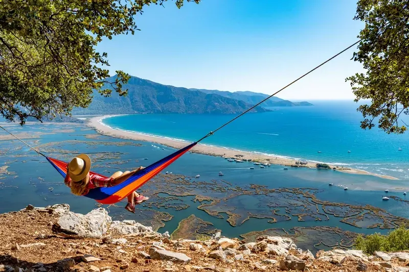 The -woman- lying-in-the-hammock-is-looking-at-the-beach-daylan