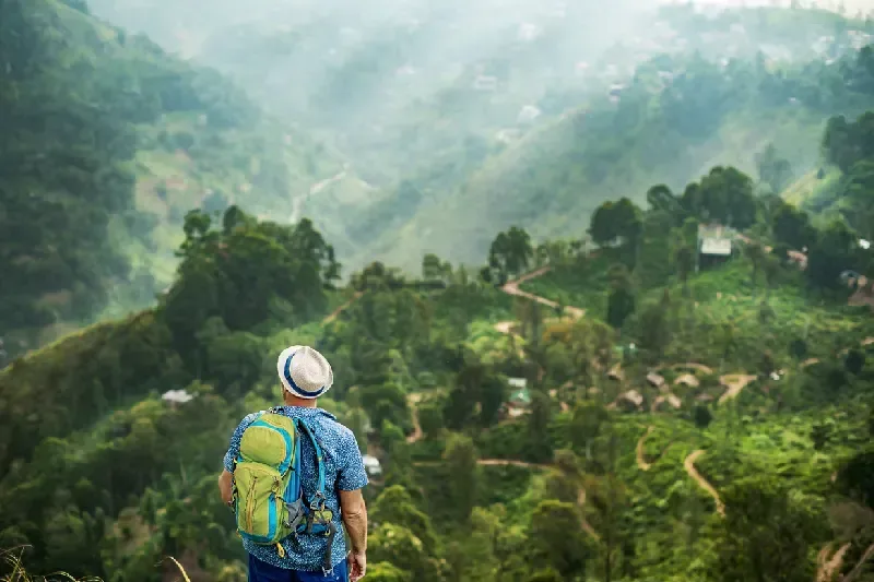 Tourist enjoying the scenic views at Little Adam’s Peak