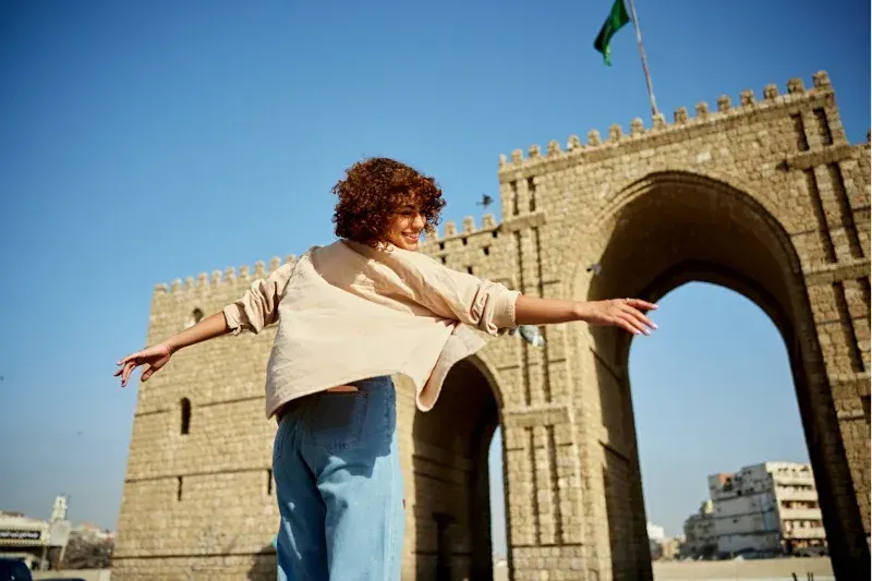 Young Middle Eastern tourist visiting Baab Makkah in Jeddah