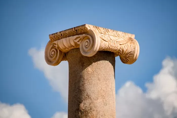 magnificent view of beautiful top of column against blue sky. Ruins of the ancient city Patara