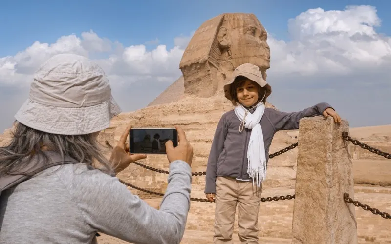 Egypt Pyramids mom taking picture for her son 