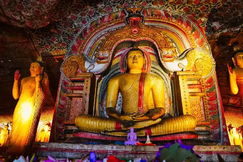 Seated Buddha under a Makara arch, Cave 3, Dambulla Cave Temple.