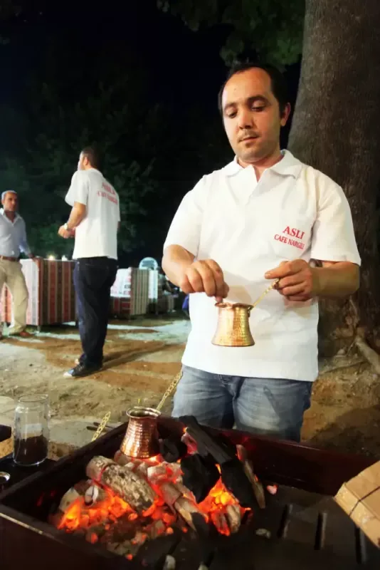 A man is making Turkish coffee in Turkey