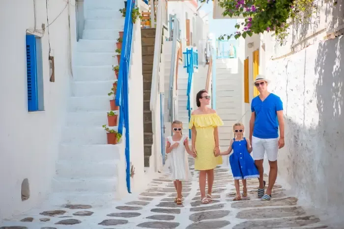 Family having fun outdoors on Mykonos streets